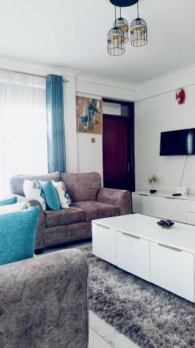 Χώρος καθιστικού στο Bomani -3 Nati Apartment