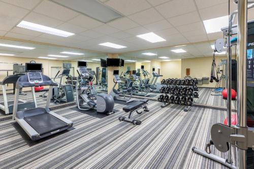 a gym with treadmills and cardio equipment in a building at Candlewood Suites Georgetown by IHG in Georgetown