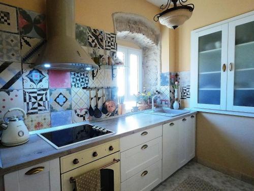 a kitchen with a sink and a counter top at Holiday house with a parking space Blato, Korcula - 24736 in Blato