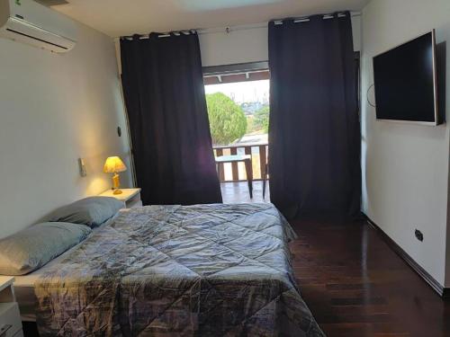 Postel nebo postele na pokoji v ubytování Suites Quartos Lindos Sobrado com Piscina no Centro