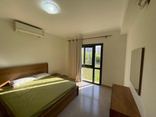 Giường trong phòng chung tại Gaia ras el hekma ground 3 beds