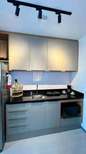 Dapur atau dapur kecil di Acorde com o Sol de Fortaleza Studio Charmoso no Meireles