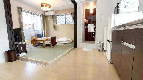 Sun生一番館 202室