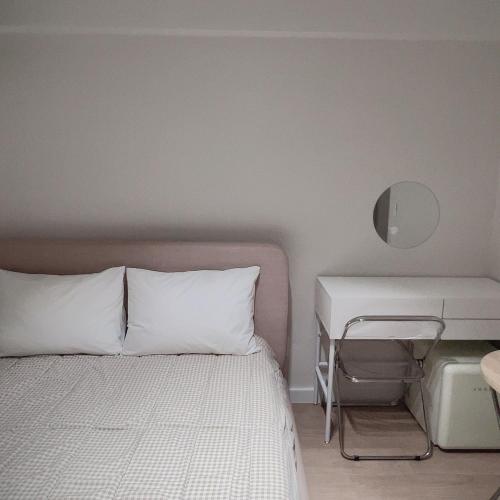 Ένα ή περισσότερα κρεβάτια σε δωμάτιο στο Staymoment