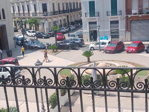 a view of a parking lot with cars parked at Helios Home in Reggio Calabria