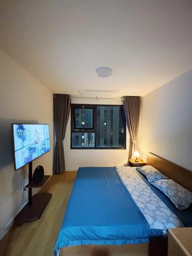 Ένα ή περισσότερα κρεβάτια σε δωμάτιο στο LiPeCo Apartment