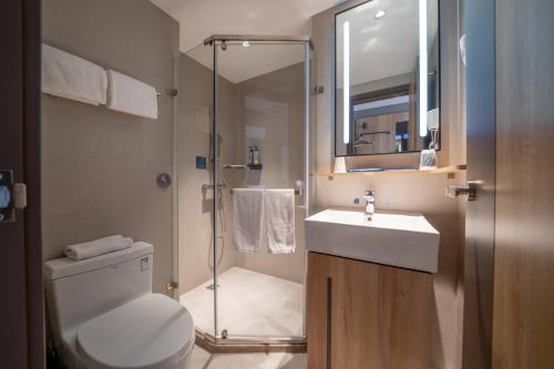 Ένα μπάνιο στο Urba Hotel Ganzhou Hongqi Avenue Branch