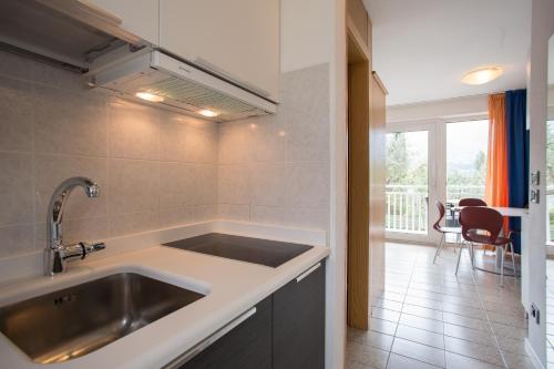 A kitchen or kitchenette at Casa Toblini al Lago on the beach