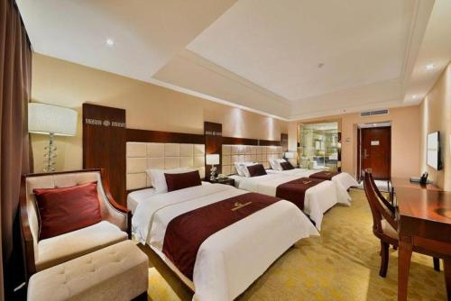 Katil atau katil-katil dalam bilik di Telecom Hotel Guilin
