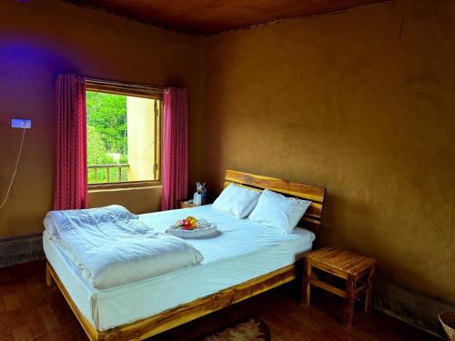 Postel nebo postele na pokoji v ubytování Giri Raj Resort Bandarban