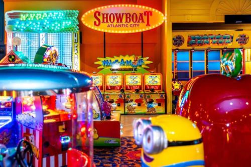 a show booth at a showroom with arcade games at CozySuites Modern Studio Condo at Showboat #29 in Atlantic City