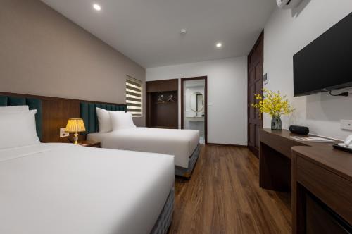 Cama o camas de una habitación en Hanoi Vista Hotel