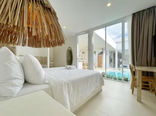 Ένα ή περισσότερα κρεβάτια σε δωμάτιο στο VON Hideaway Villa by Maheswara