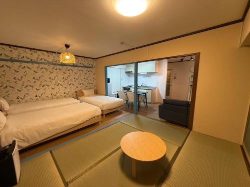 Una cama o camas en una habitación de Stay Hakata