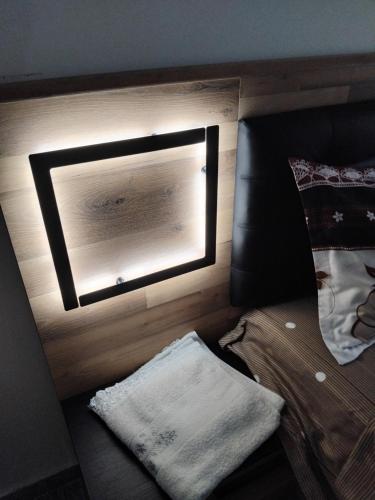 Postel nebo postele na pokoji v ubytování Manu Apartament