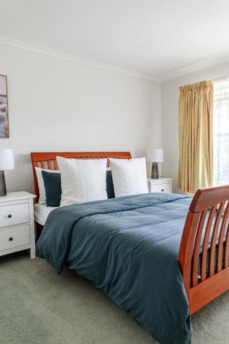 Ένα ή περισσότερα κρεβάτια σε δωμάτιο στο Cosy Family Getaway