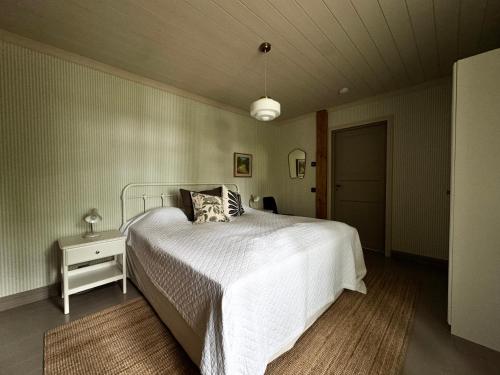 Postel nebo postele na pokoji v ubytování Luxury Villa in Southern Finland