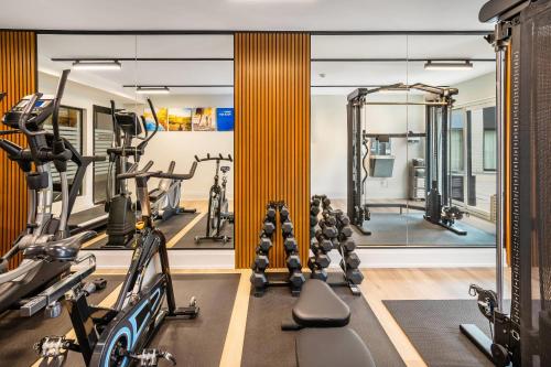 a gym with treadmills and cardio machines at Comfort Inn in Guelph