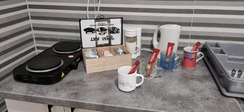 Kuchyň nebo kuchyňský kout v ubytování Quiet Suites Sarajevo - Apartments & Rent A Car