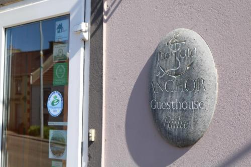 The Old Anchor B&B Annascaulに飾ってある許可証、賞状、看板またはその他の書類