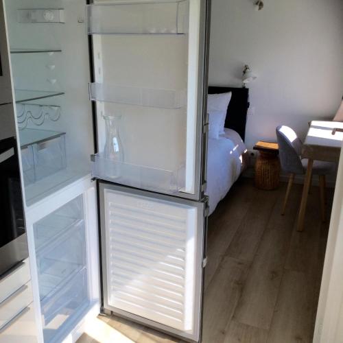 Η κουζίνα ή μικρή κουζίνα στο La Maisonnette de Senlis