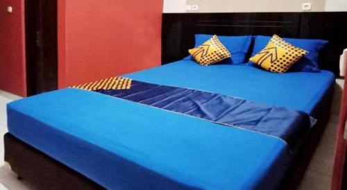 Cama o camas de una habitación en SPOT ON 3605 Clarichie Guest House