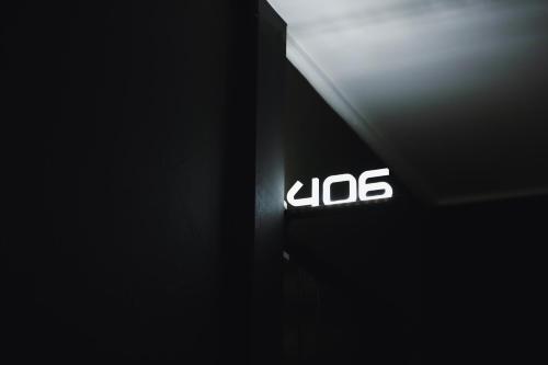 a close up of the zos sign on a wall at 부천 인생호텔 in Bucheon
