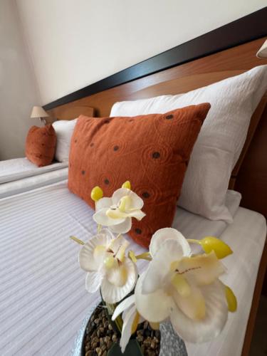 Postel nebo postele na pokoji v ubytování Hotel Petar