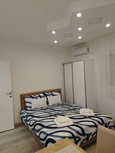 Postel nebo postele na pokoji v ubytování Ljilja Studio Apartman