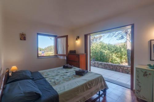 Postel nebo postele na pokoji v ubytování Casa Mirella- Portobello