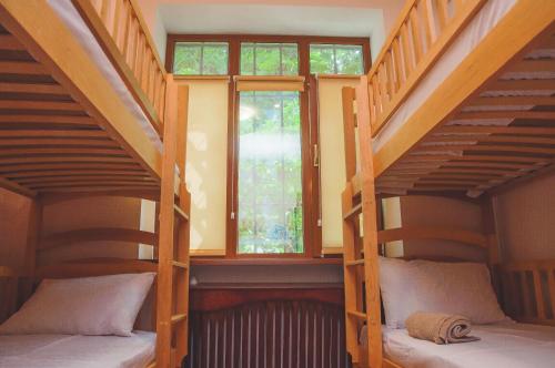 Postel nebo postele na pokoji v ubytování Globus Hostel