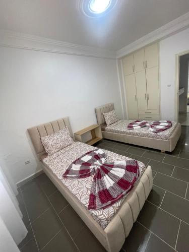 Postel nebo postele na pokoji v ubytování Spacieux Appartement a 2pas a la plage
