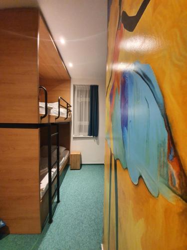 Postel nebo postele na pokoji v ubytování Garda Hotel