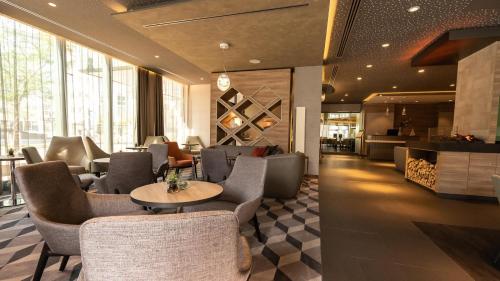 Χώρος καθιστικού στο Hotel Panorama Hamburg-Harburg