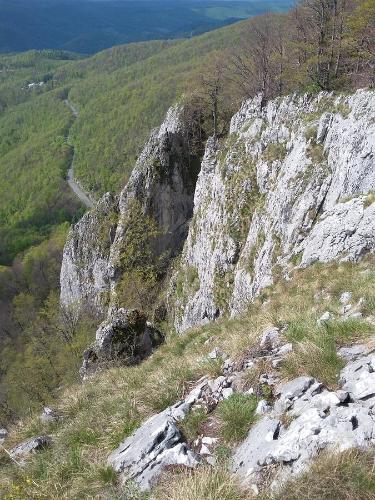 a rocky mountain with a road on it at Pensiunea Piatra Graitoare in Vartop