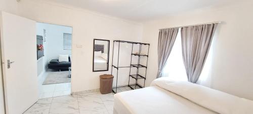 Katil atau katil-katil dalam bilik di Holiday Property