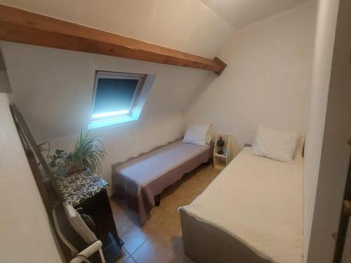 Posteľ alebo postele v izbe v ubytovaní Chalet rustique à La Salvetat-sur-Agout avec vue montagne