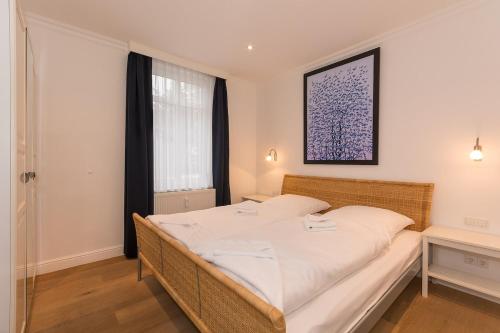 Postel nebo postele na pokoji v ubytování Ferienwohnung Elbsegler - Villa Ahlbeck, Binz