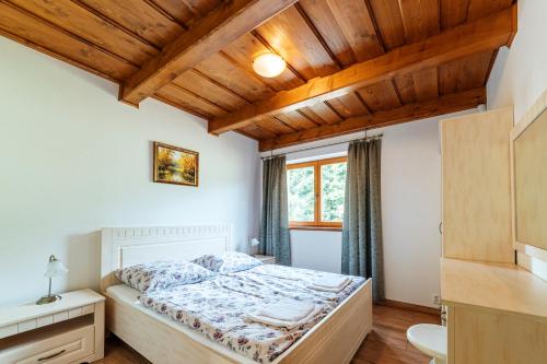 Postel nebo postele na pokoji v ubytování Pod Miloňovou