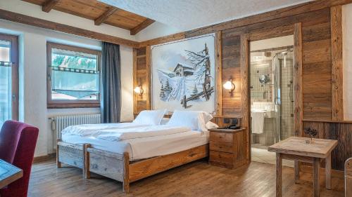 Postel nebo postele na pokoji v ubytování Hotel Crosal