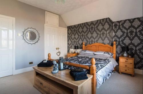 Кровать или кровати в номере Ty Mynydd Lodge