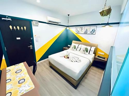 Postel nebo postele na pokoji v ubytování Smile Hotel Subang Airport