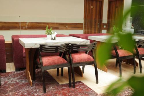 Posezení v ubytování JEYAN INN BY Golden Tree