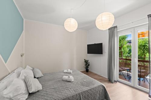 En eller flere senge i et værelse på Apartment Fiorella