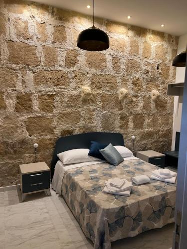 Postel nebo postele na pokoji v ubytování Lapis rooms