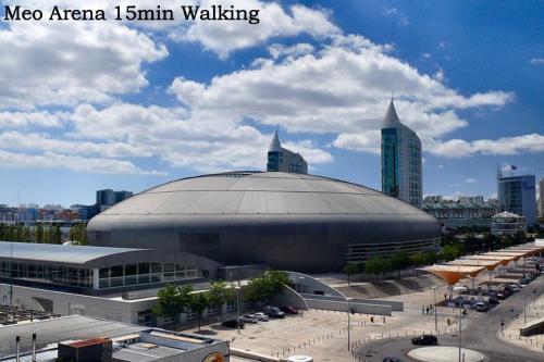 a large building with a large dome in a city at Oriente DNA Studios II in Lisbon