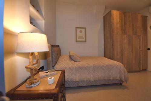 Ένα ή περισσότερα κρεβάτια σε δωμάτιο στο Vivian Suites Thea
