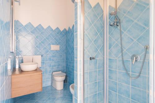 Koupelna v ubytování Residence Rocce Rosse