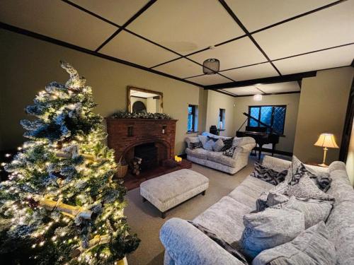 Ένα ή περισσότερα κρεβάτια σε δωμάτιο στο Rinsey Cottage