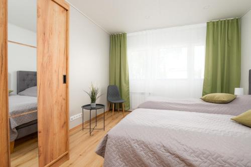 Papiniidu Apartmentにあるベッド